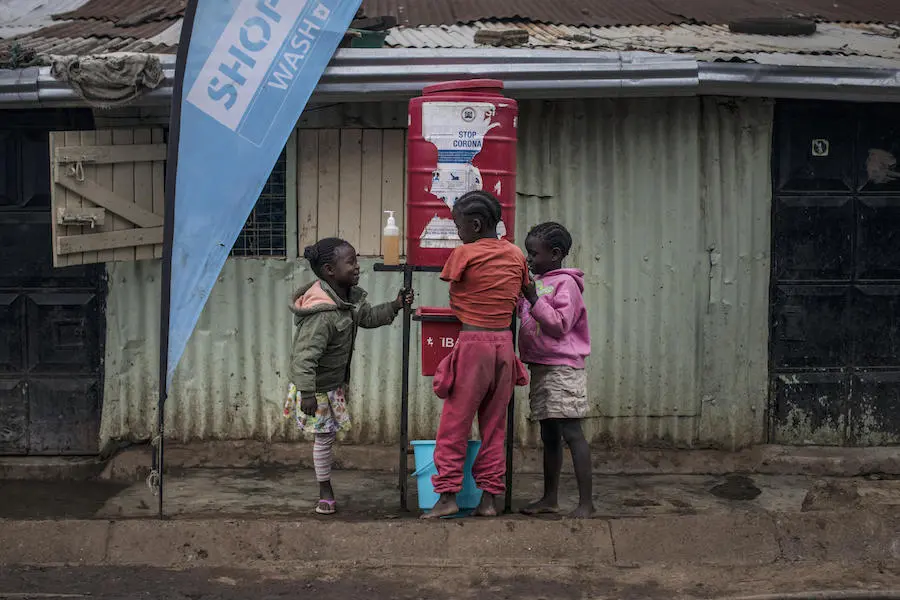 On 28 September 2020, children use a tank-based handwashing station in Kibera, the biggest informal settlement in Nairobi, Kenya. On 28 September 2020, children use a tank-based handwashing station in Kibera, the biggest informal settlement in Nairobi, Kenya.