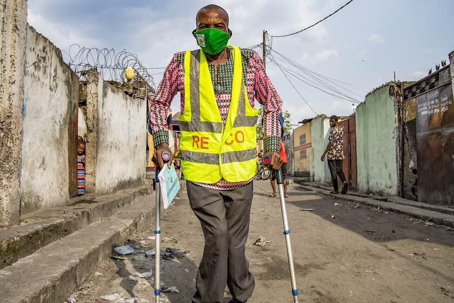 Richard Elaka, 60, is a polio survivor in Kinshasa, DR Congo. He was infected at the age of 7 and has been moving around on crutches ever since.