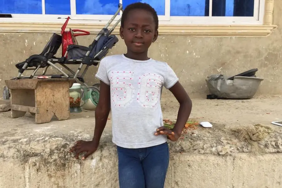 On 21 October 2020, 9-year-old Christabel Owusu-Ampofo poses for a portrait in Ghana. Christabel helped a vaccination team find and vaccinate unimmunized children during the recent national polio vaccination campaign. She approached a vaccination monitori On 21 October 2020, 9-year-old Christabel Owusu-Ampofo poses for a portrait in Ghana. Christabel helped a vaccination team find and vaccinate unimmunized children during the recent national polio vaccination campaign. She approached a vaccination monitori