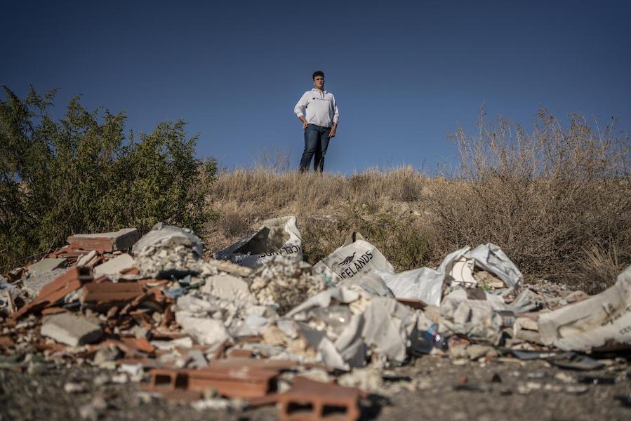 Environmental activist Juan, 17, regularly cleans up the garbage that accumulates in the fields surrounding his hometown, Almería, Spain. 