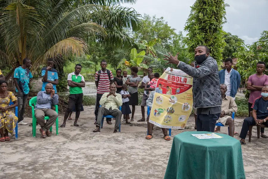 A community health worker raises awareness about Ebola and COVID-19 in Mama Balako health district, Mbandaka, DR Congo. A community health worker raises awareness about Ebola and COVID-19 in Mama Balako health district, Mbandaka, DR Congo.