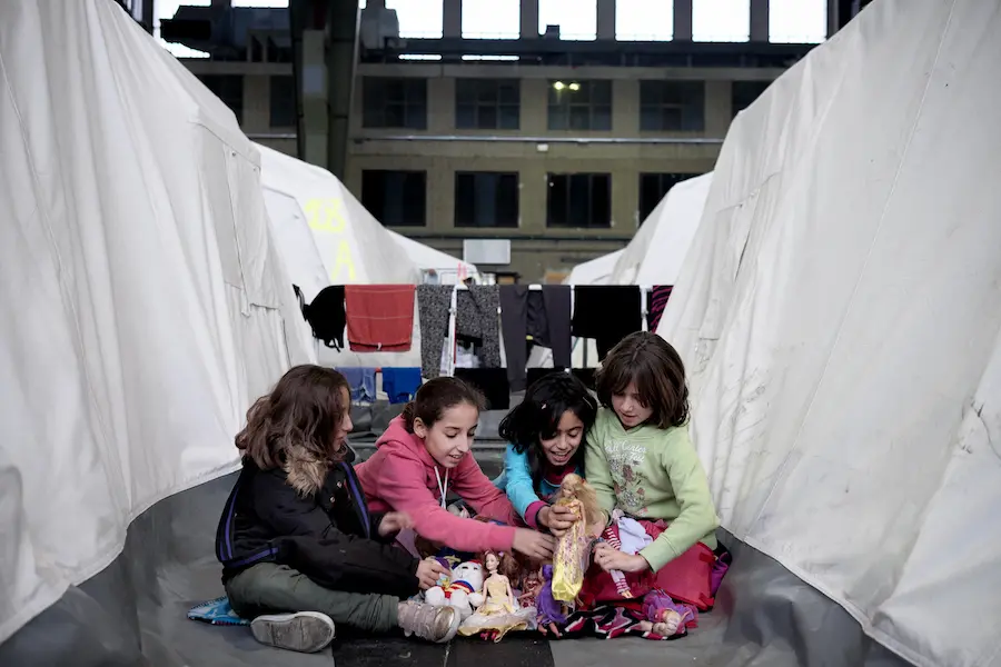 Girls Playing with Dolls