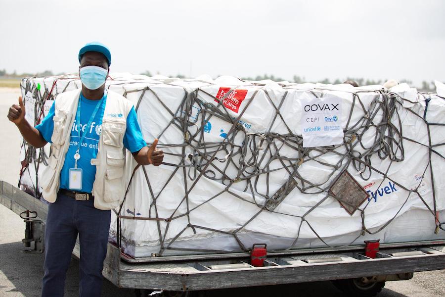 On February 26, 2021, (left to right) UNICEF supply officer Mohamadou Sy at the airport in Abidjan. Cote d’Ivoire received 504,000 COVID-19 vaccine doses from the COVAX Facility at the airport in Abidjan. 