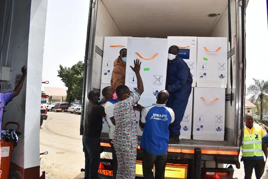 On March 2, 2021, workers offload a shipment containing 3.94 million doses of COVID-19 vaccines procured by the COVAX Facility at the Nnamdi Azikiwe International Airport in Abuja, Nigeria. On March 2, 2021, workers offload a shipment containing 3.94 million doses of COVID-19 vaccines procured by the COVAX Facility at the Nnamdi Azikiwe International Airport in Abuja, Nigeria.