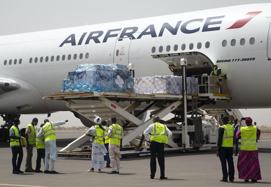 Mali's first batch of COVID-19 vaccines, procured by UNICEF through the COVAX Facility, arrives at Keita International Airport in Bamako on March 5, 2021.