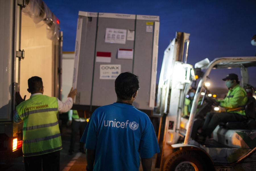 UNICEF Workers Loading a Truck