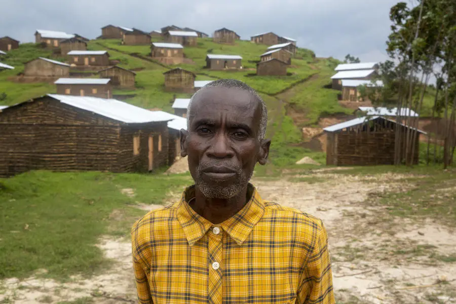 Community leader Thomas Misego, 62, in Gisheke, Burundi, where villagers rebuilt their homes after a series of landslides devastated the area. Community leader Thomas Misego, 62, in Gisheke, Burundi, where villagers rebuilt their homes after a series of landslides devastated the area.