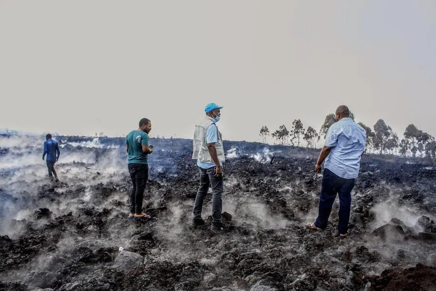 On May 23, 2021, UNICEF and Congolese Red Cross staff survey damaged caused by volcanic eruption in Goma, Democratic Republic of the Congo. On May 23, 2021, UNICEF and Congolese Red Cross staff survey damaged caused by volcanic eruption in Goma, Democratic Republic of the Congo.
