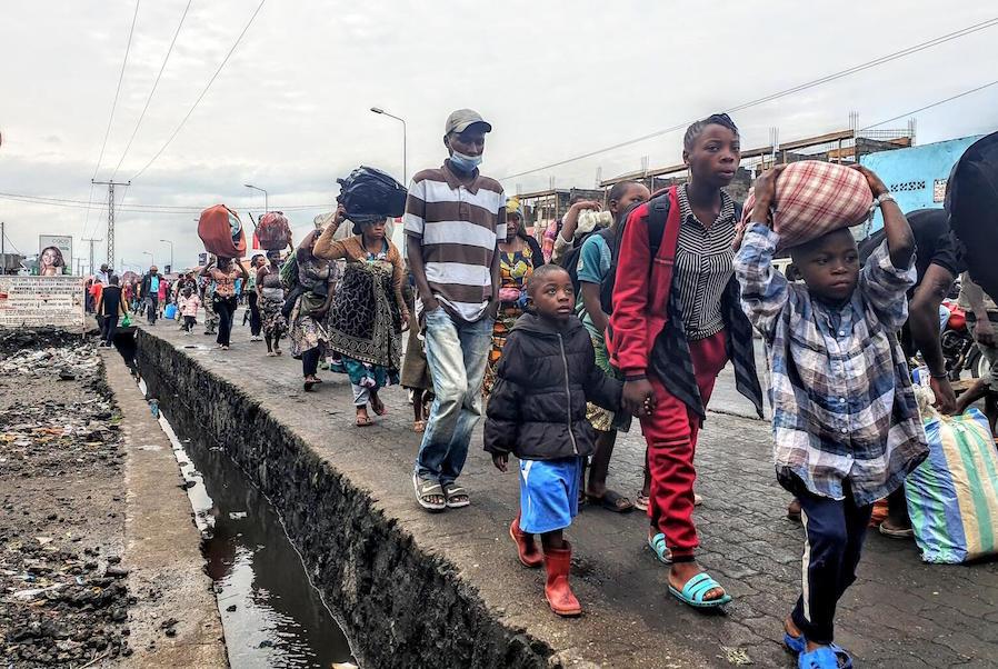 In the Democratic Republic of the Congo on May 27, 2021, residents of the city of Goma evacuate to Sake following warnings that Mount Nyiragongo might erupt a second time. 