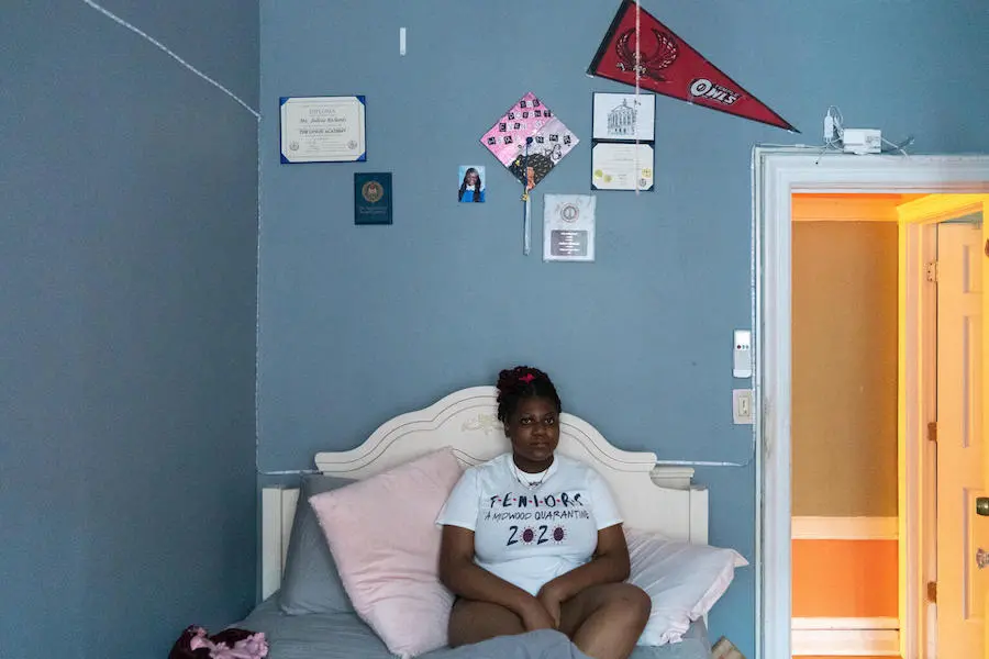 Girl Sitting Up in Bed