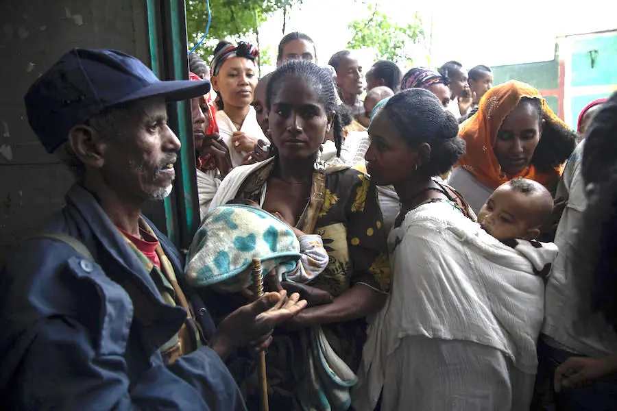 Worried mothers wait to have their children screened for malnutrition at a UNICEF center in Tigray, Ethiopia in July 2021. Worried mothers wait to have their children screened for malnutrition at a UNICEF center in Ethiopia's Tigray region in July 2021.