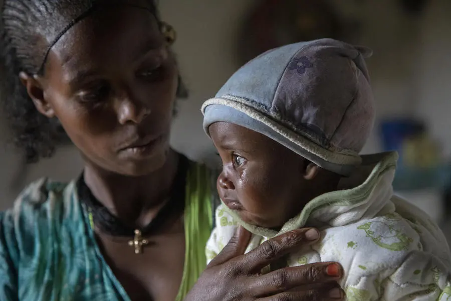 Woman Looking at Baby