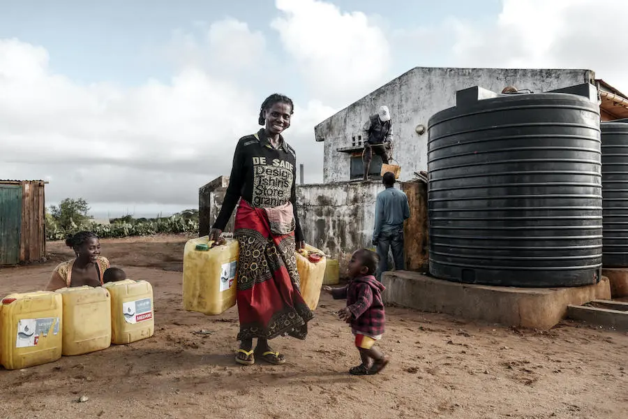 Masy, 35, collects water at a UNICEF-supported distribution point in Maroalopoty, Ambovombe commune, Androy Region. Masy, 35, collects water at a UNICEF-supported distribution point in Maroalopoty, Ambovombe commune, Androy Region.