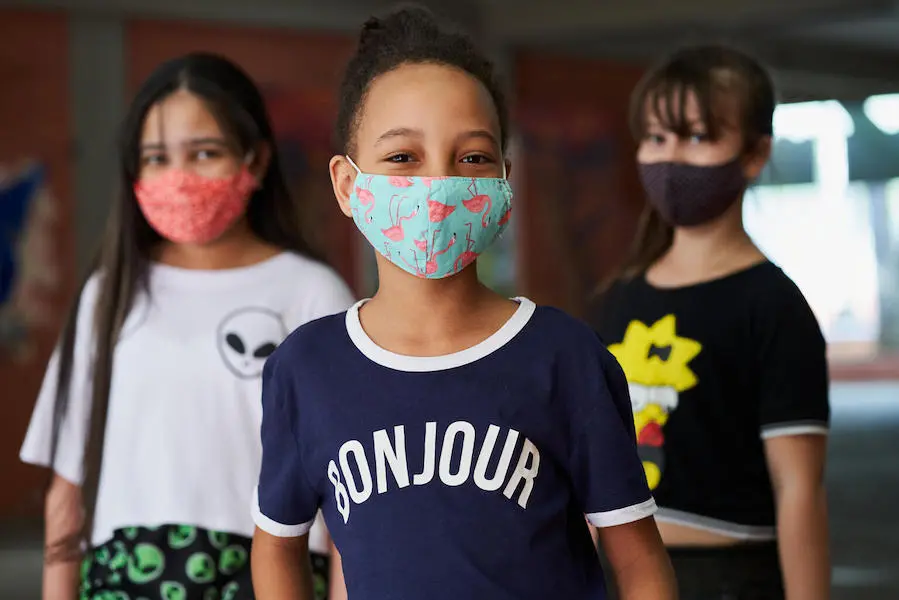 Three 10-year-old students – Maria Eduarda, Jaqueline and Estela – are in the school courtyard at Brigadeiro Gavião Peixoto State School, in São Paulo, Brazil. Three 10-year-old students – Maria Eduarda, Jaqueline and Estela – are in the school courtyard at Brigadeiro Gavião Peixoto State School, in São Paulo, Brazil.