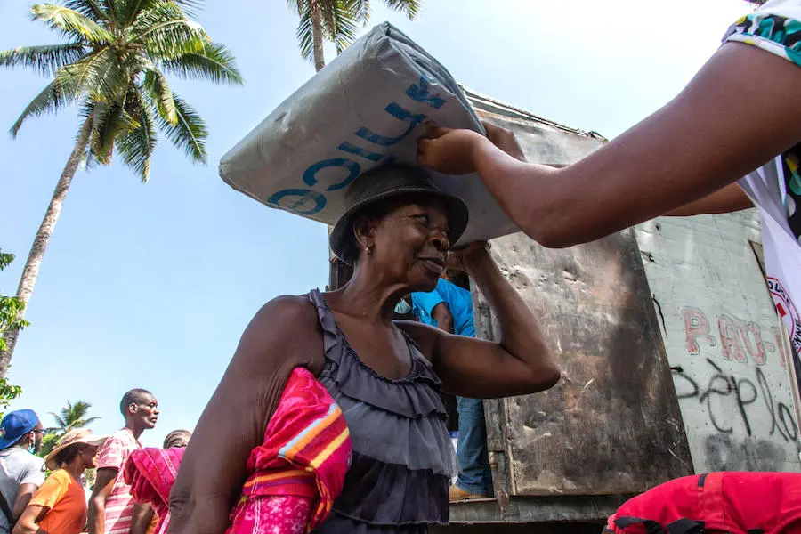 On August 18, 2021 in Valere, a village in Haiti's Sud Department, UNICEF workers distribute emergency supplies to families affected by Haiti's August 14, 2021 earthquake. On August 18, 2021 in Valere, a village in Haiti's Sud Department, UNICEF workers distribute emergency supplies to families affected by Haiti's August 14, 2021 earthquake.