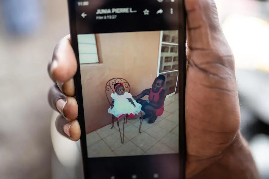 Picture of Woman and Baby on Phone