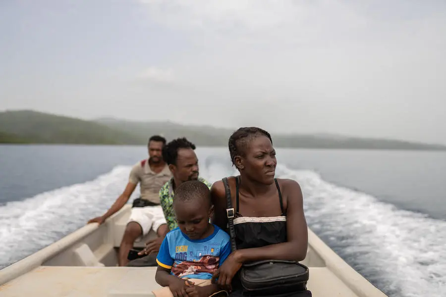 3 Adults and 1 Child on Boat