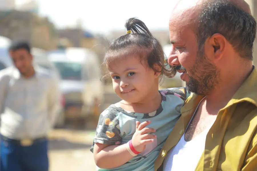 Salma, who was born with Down Syndrome, went with her father to get her measles and polio vaccines during a UNICEF-supported immunization campaign in the Community College camp for internally displaced persons in Marib City, Yemen. Salma, who was born with Down Syndrome, went with her father to get her measles and polio vaccines during a UNICEF-supported immunization campaign in the Community College camp for internally displaced persons in Marib City, Yemen.