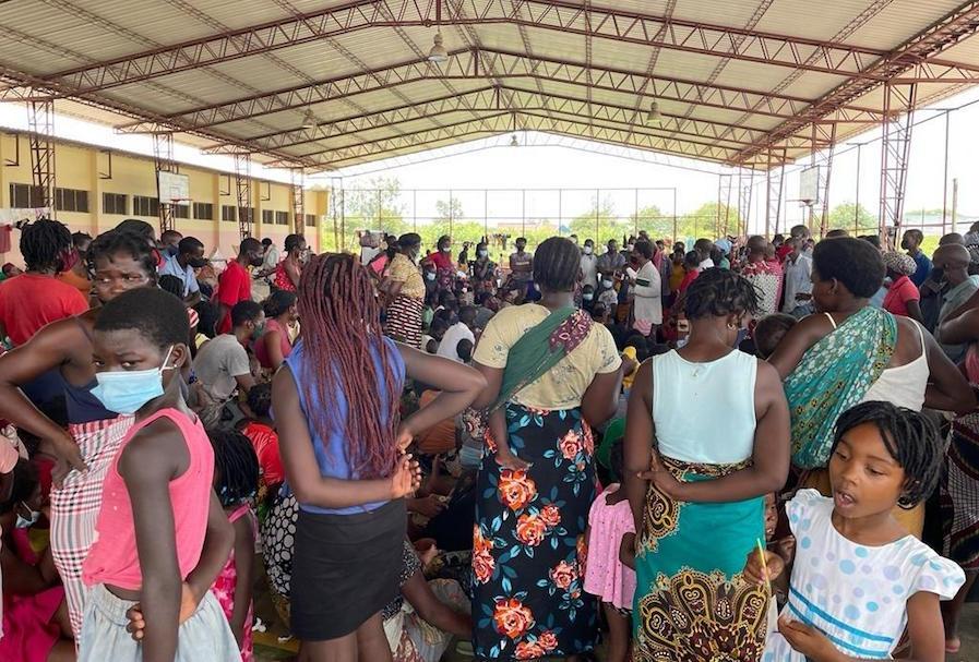 Families gather for safety in a site for displaced persons in Tete, northern Mozambique after Tropical Storm Ana hit parts of the country on January 24, 2022.