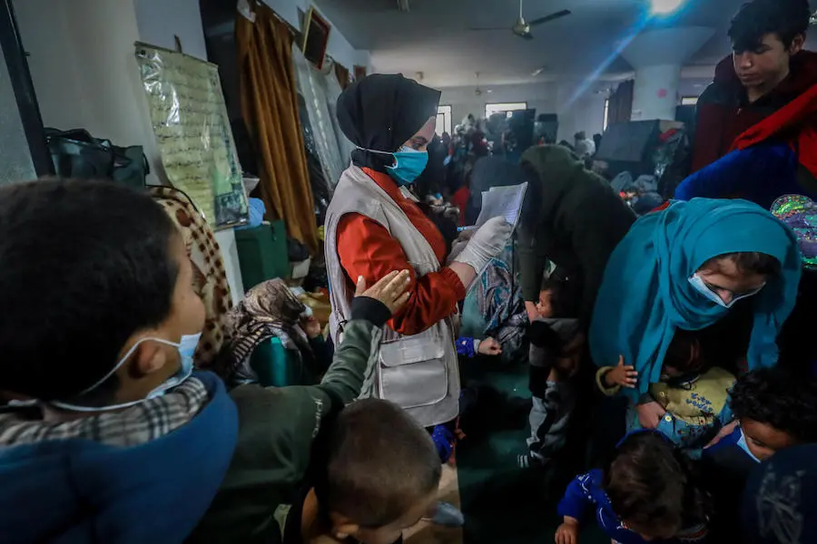 UNICEF volunteers conducting rapid needs assessment for the new arrived families to refer them to the services at Musab Bin Omair mosque, Tal Hajar, Hasakah city, northeast Syria on January 27, 2022. UNICEF volunteers conducting rapid needs assessment for the new arrived families to refer them to the services at Musab Bin Omair mosque, Tal Hajar, Hasakah city, northeast Syria on January 27, 2022.
