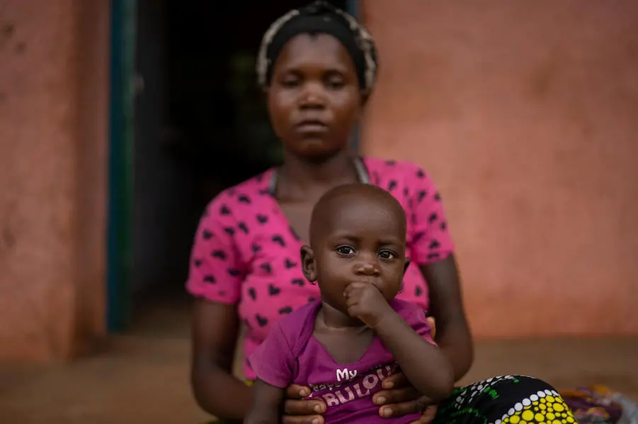 Dorca Genito, 24, and her baby son lost everything but the clothes on their backs when Tropical Storm Ana destroyed their house in the community of Pires, Zambezia province on January 24, 2022. Dorca Genito, 24, and her baby son lost everything but the clothes on their backs when Tropical Storm Ana destroyed their house in the community of Pires, Zambezia province on January 24, 2022.