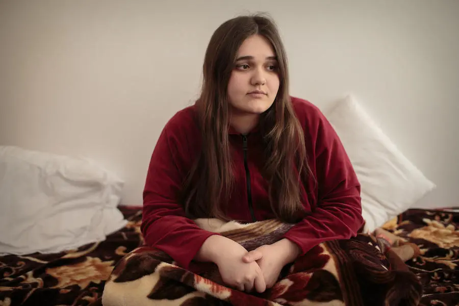 Karina, 17, a student from a village near Mykolaiv, Ukraine, who ended up in Huși, Romania. Karina, 17, a student from a village near Mykolaiv, Ukraine, who ended up in Huși, Romania.