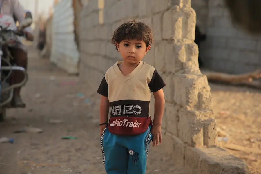 Displaced by war in Yemen, Khalid, 3, has been living for 5 years in a tent with her parents in a camp for people who have fled the fighting. Displaced by war in Yemen, Khalid, 3, has been living for 5 years in a tent with her parents in a camp for people who have fled the fighting.