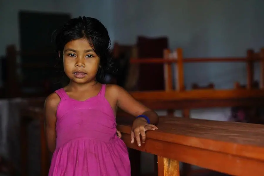 Heavy flooding in northeastern Bangladesh in May 2022 forced 8-year-old Saida and her family into a flood shelter in Sunamganj, Bangladesh. Heavy flooding in northeastern Bangladesh in May 2022 forced 8-year-old Saida and her family into a flood shelter in Sunamganj, Bangladesh.