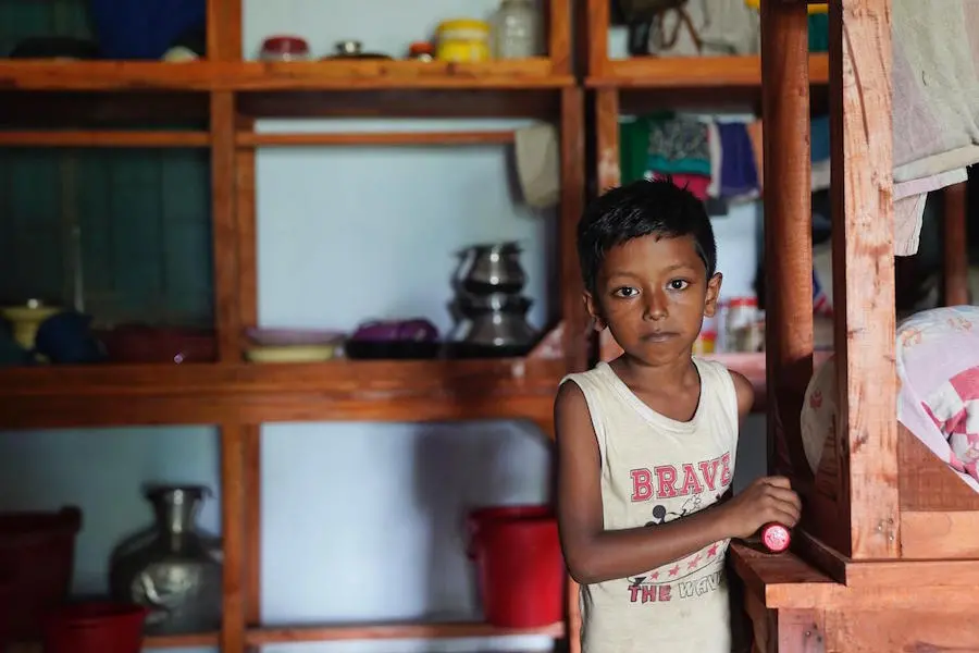 Seven-year-old Sihab’s entire village was flooded by heavy rainfall in northeastern Bangladesh in May 2022. Seven-year-old Sihab’s entire village was flooded by heavy rainfall in northeastern Bangladesh in May 2022.