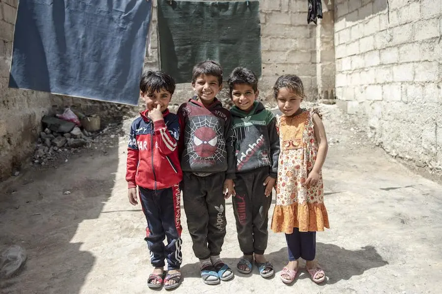 Hasan, 6, with his cousins Mohammad, 8, Ahmad, 7, and Sham, 6, in their neighbourhood in Kherbet Alward, Rural Damascus, Syria Hasan, 6, with his cousins Mohammad, 8, Ahmad, 7, and Sham, 6, in their neighbourhood in Kherbet Alward, Rural Damascus, Syria