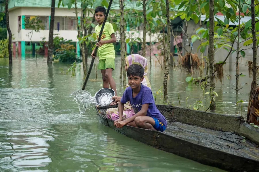 Woman and Two Boys in a Boat