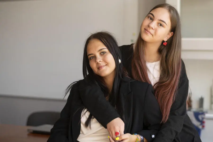 Sisters Yevheniia, 19, left, and Katya, 12, come from Bucha, Ukraine. Yevheniia works at the UNICEF-supported school in Krakow, Poland, where Katya is in the seventh grade. Sisters Yevheniia, 19, left, and Katya, 12, come from Bucha, Ukraine. Yevheniia works at the UNICEF-supported school in Krakow, Poland, where Katya is in the seventh grade.
