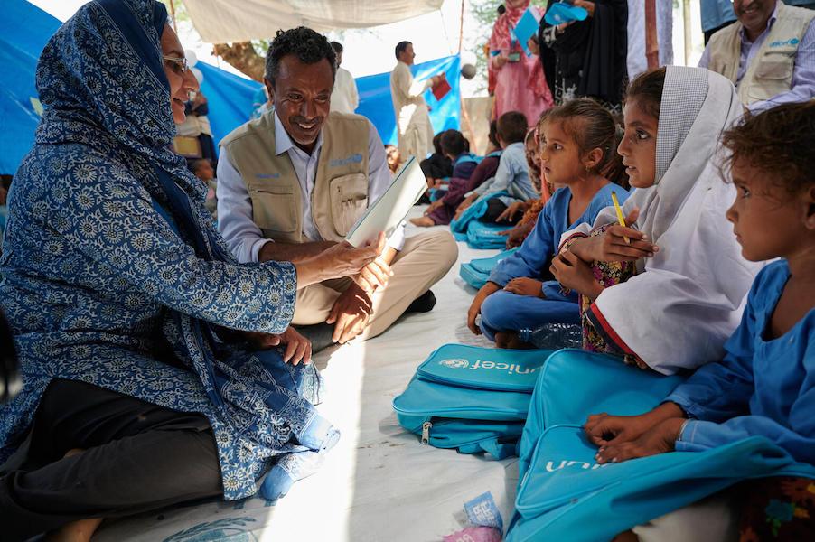 On Sept. 17, 2022, Abdullah Fadil, UNICEF Pakistan Country Representative, sits down to speak with children at a UNICEF-supported Temporary Learning Center in flood-devastated Punjab Province, Pakistan.