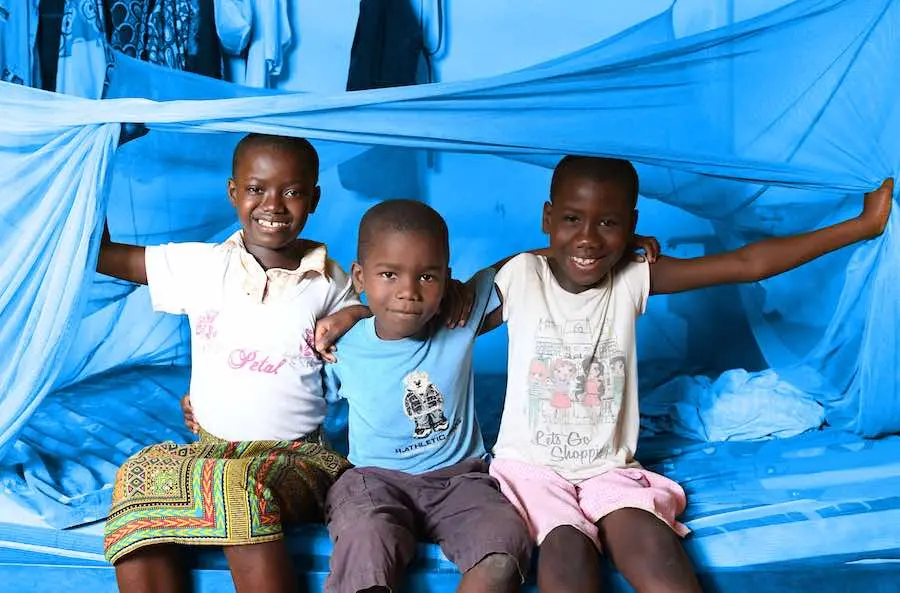 Pauline Kouissi Kossia, 35 years old, her husband and her four children, aged two to 11, have been sleeping under mosquito nets for the past six years. They live in the village of Parhadi in the North East of Côte d'Ivoire. With her husband, Nicolas Kouis Pauline Kouissi Kossia, 35 years old, her husband and her four children, aged two to 11, have been sleeping under mosquito nets for the past six years. They live in the village of Parhadi in the North East of Côte d'Ivoire. With her husband, Nicolas Kouis
