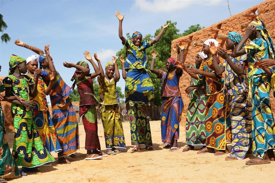 Girls play and sing in the Garin Badjini village in the Maradi region of Niger in 2010. 