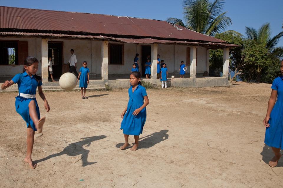 School children play football at the Golachhari Government Primary School in Rangamati, one of the most disadvantaged and isolated areas of Bangladesh. 