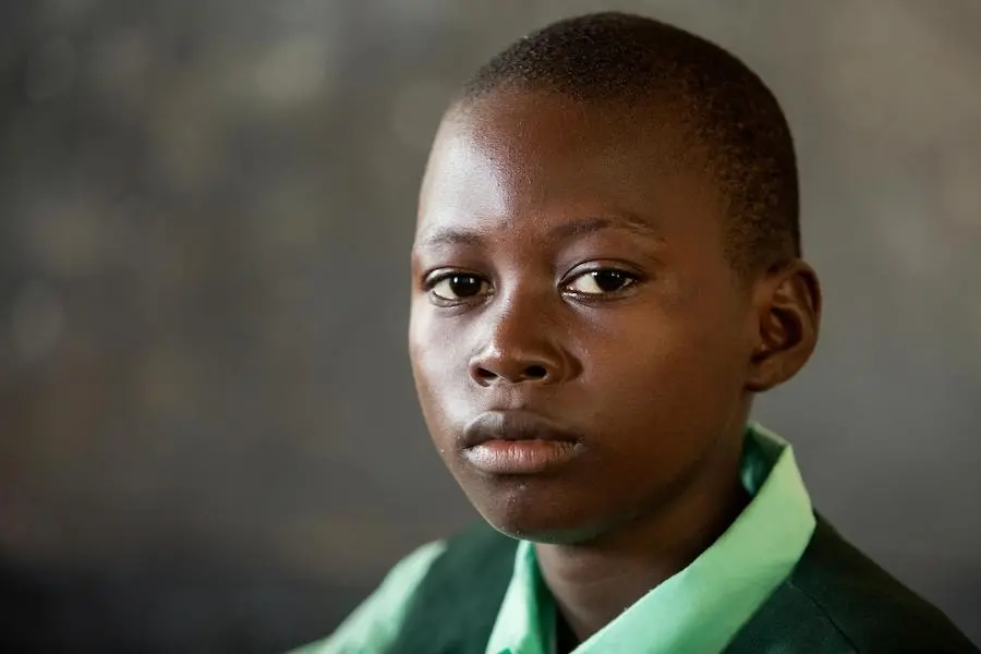 Jan, 13, lives in Waterloo, Sierra Leone. He wants to be a scientist when he grows up. Jan, 13, lives in Waterloo, Sierra Leone. He wants to be a scientist when he grows up.