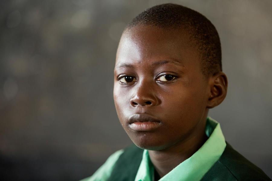 Jan, 13, lives in Waterloo, Sierra Leone. He wants to be a scientist when he grows up. 