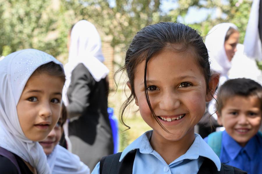 Primary students on the playground at UNICEF-supported Turgani High School in Faizabad, a northeastern province of Afghanistan, in August 2019.