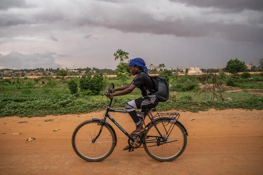 Pascaline lives in Lacouroussou, a poor neighborhood of Niamey, the capital of Niger. A UNICEF-supported soccer program has helped her stay in school. Pascaline lives in Lacouroussou, a poor neighborhood of Niamey, the capital of Niger. A UNICEF-supported soccer program has helped her stay in school.