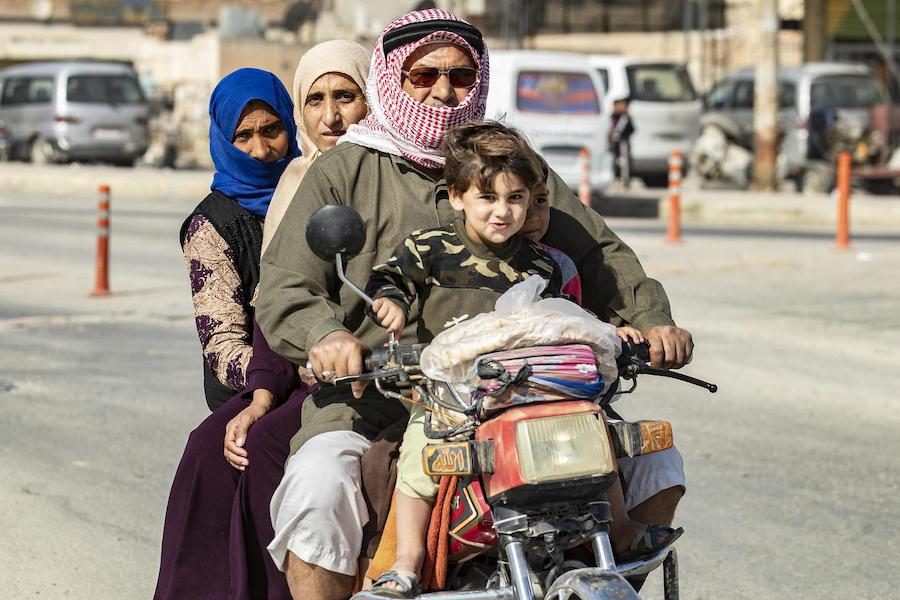 Families continue to flee ecalating violence in northeast Syria in October 2019.