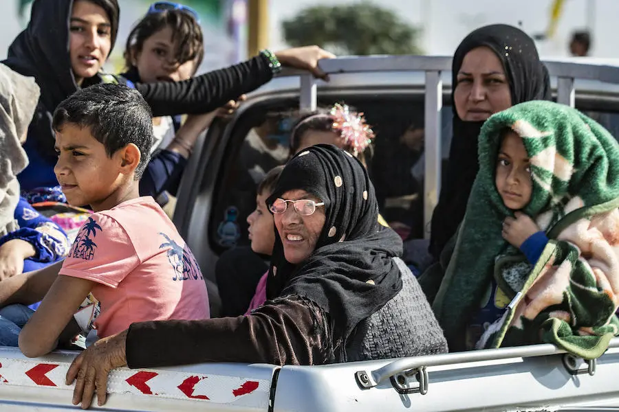 Families continue to flee escalating violence in northeast Syria in October 2019. Families continue to flee escalating violence in northeast Syria in October 2019.