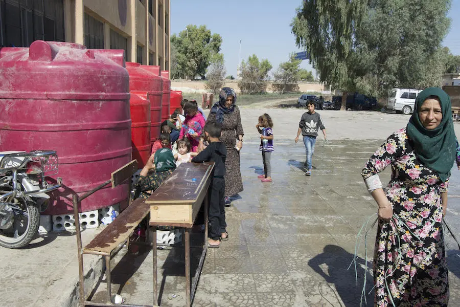In October 2019 in Tal Tamer and Hasakeh city, northeast Syria, UNICEF and partners are reaching families in collective shelters in with safe water supply through water trucking. In October 2019 in Tal Tamer and Hasakeh city, northeast Syria, UNICEF and partners are reaching families in collective shelters in with safe water supply through water trucking.