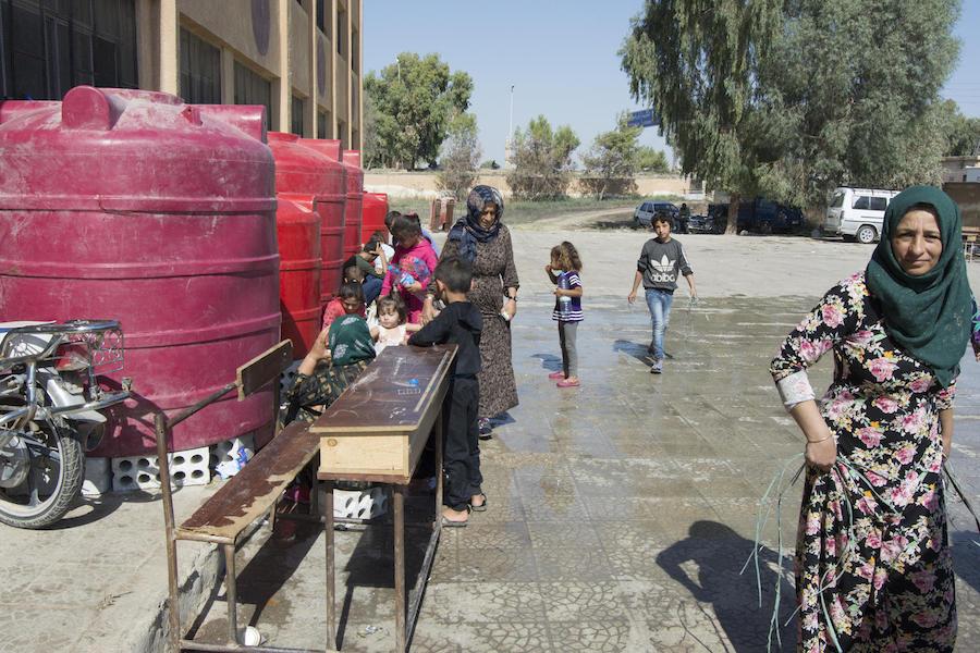 In October 2019 in Tal Tamer and Hasakeh city, northeast Syria, UNICEF and partners are reaching families in collective shelters in with safe water supply through water trucking. 