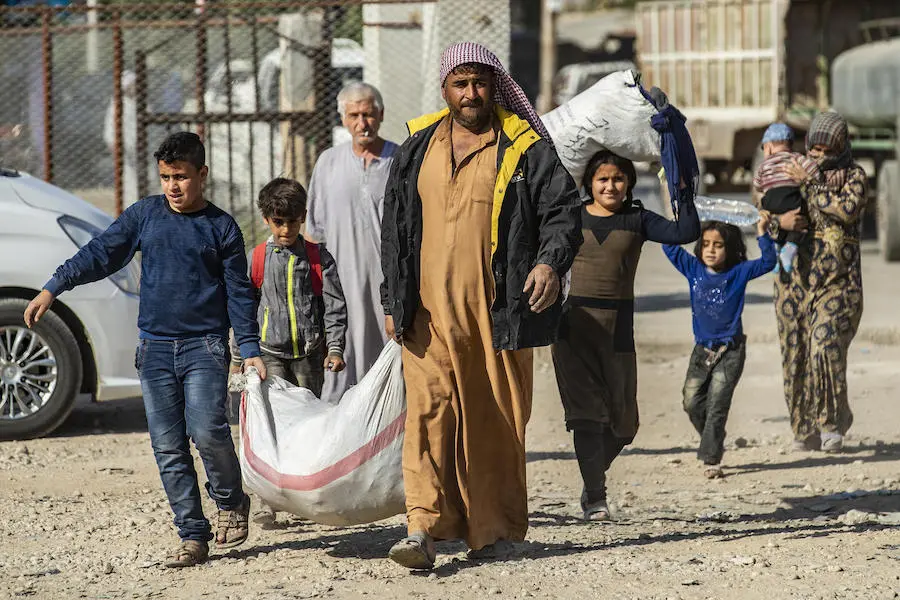 In October 2019, families fleeing escalating violence in northeast Syria continue to arrive in Tal Tamar. In October 2019, families fleeing escalating violence in northeast Syria continue to arrive in Tal Tamar.