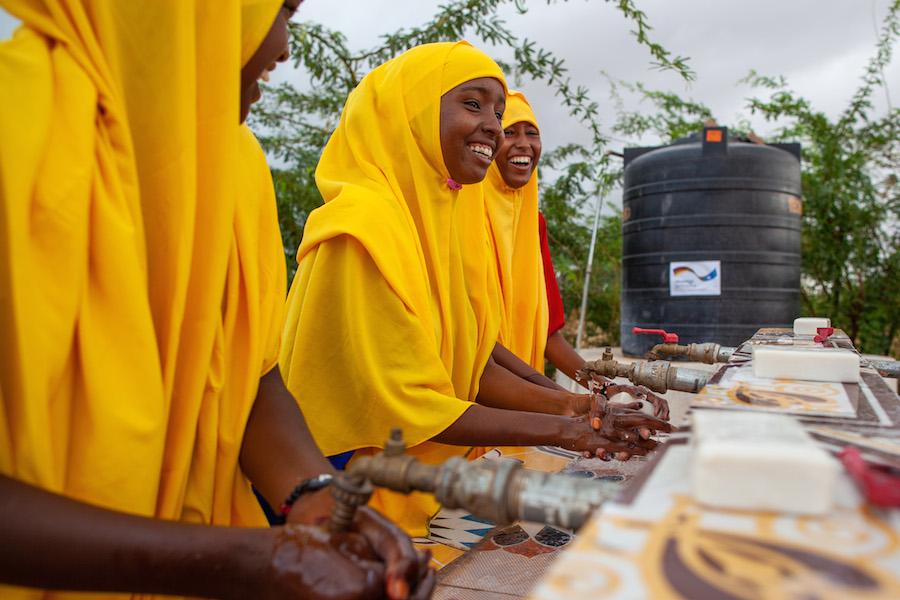 UNICEF works with partners to ensure that schools serving vulnerable populations — such as the Qansahley Primary School in Dollow, Somalia — have adequate facilities to support healthy hygiene practices, like washing up before meals.