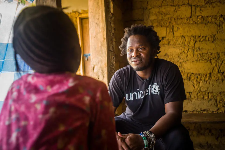 Former child soldier and UNICEF Goodwill Ambassador Ishmael Beah talks with 8-year-old Adama*, who was sexually abused by a teacher at her school in Sierra Leone's Tonkolili district. (*Name changed for her protection) Former child soldier and UNICEF Goodwill Ambassador Ishmael Beah talks with 8-year-old Adama*, who was sexually abused by a teacher at her school in Sierra Leone's Tonkolili district. (*Name changed for her protection)