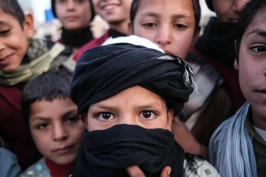 On 22 November 2019, a group of boys stand outside Shaheed Abdul Ahad Khan Karzai Orphanage in Kandahar, Afghanistan. On 22 November 2019, a group of boys stand outside Shaheed Abdul Ahad Khan Karzai Orphanage in Kandahar, Afghanistan.