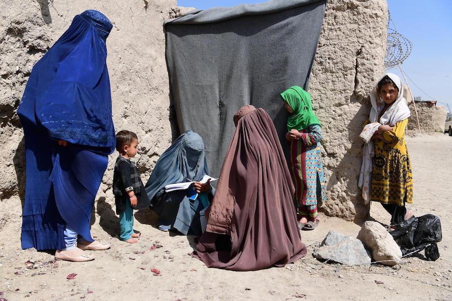 A child is being vaccinated against polio, during a polio social mobilization activity in the community, in Kandahar, Afghanistan.