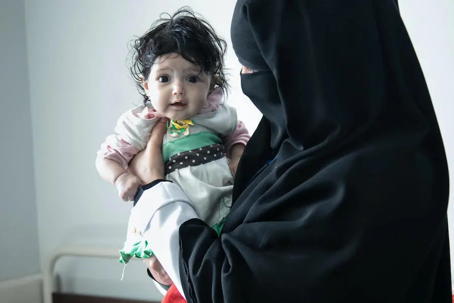 A six-month-old girl suffering from malnutrition checks into a UNICEF-supported hospital in Sana’a for treatment. A six-month-old girl suffering from malnutrition checks into a UNICEF-supported hospital in Sana’a for treatment.